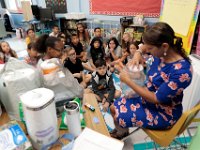 Fifth grade Paula Mahmoud looks at the school supplies brought in by her 5th grade students at the Casimir Pulaski elementary school, as students across New Bedford return to school.  [ PETER PEREIRA/THE STANDARD-TIMES/SCMG ]